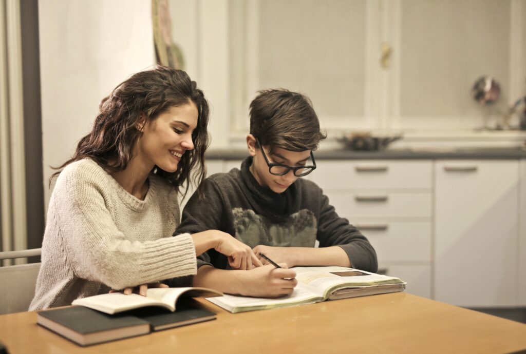 parent and child reading together to build language comprehension